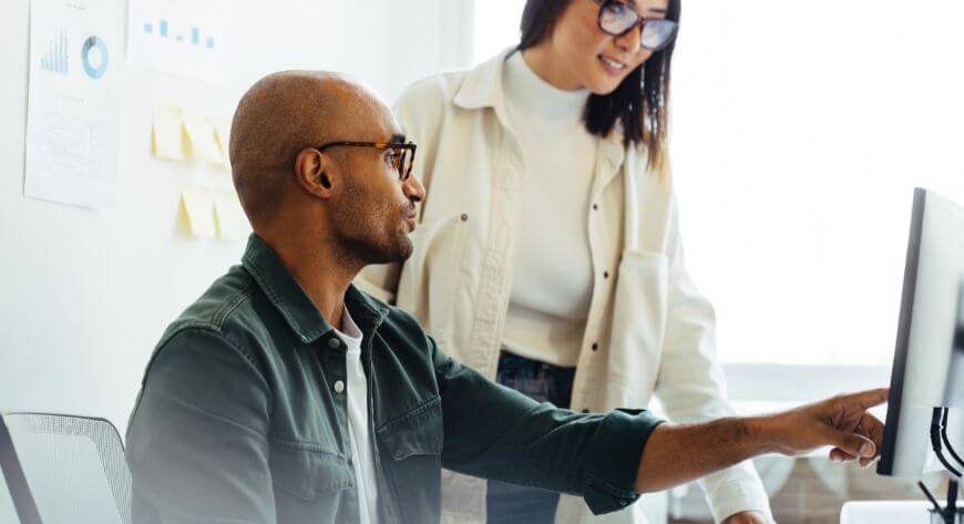 Team working on data migration, image