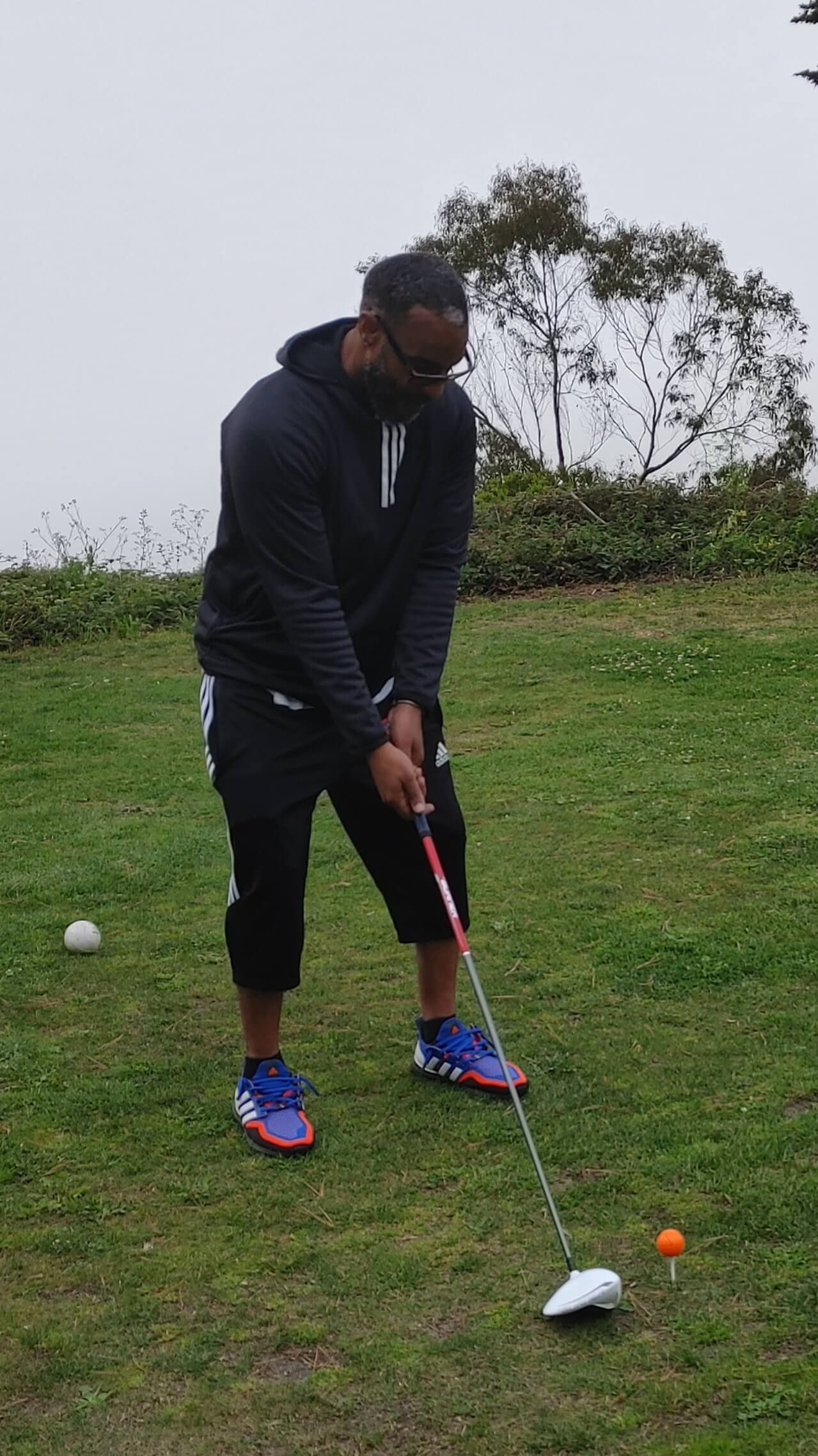 Anthony Poe Golfing